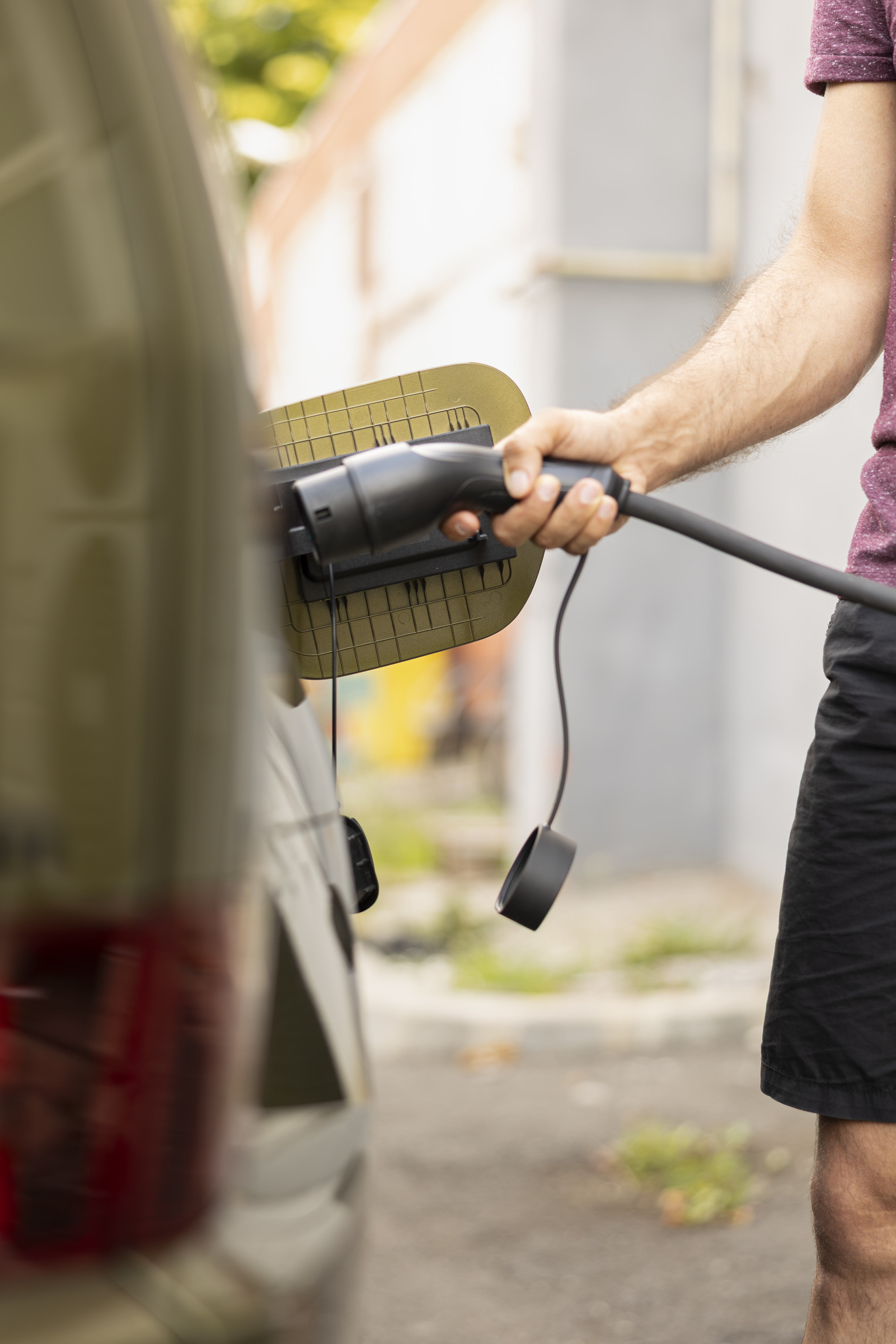 Mp68625994 Close Up Shot Of Man Charging Ev Vehicle Parked At Station